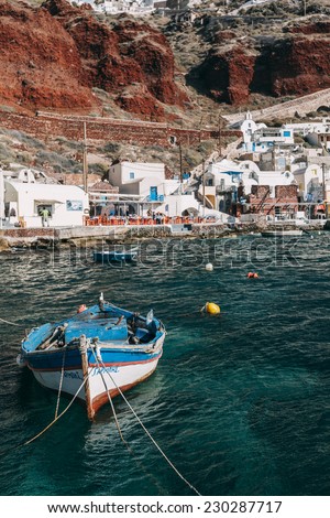 AMMOUDI, OIA, SANTORINI, GREECE - NOVEMBER 3: boat on Ammoudi bay in Oia, Santorini, Greece on November 3, 2014.