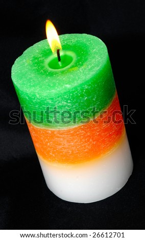 colored candle on black