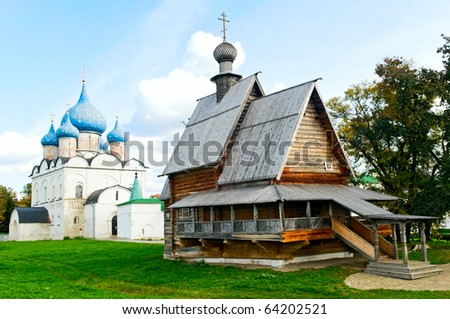 Cathedral of the Nativity and wooden church of St. Nicholas in Suzdal Kremlin, Russia