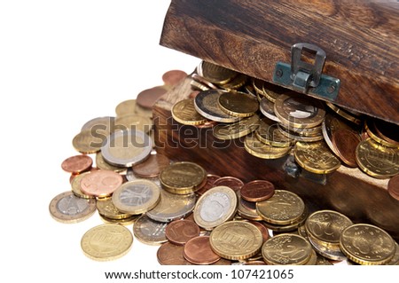Treasure box with coins isolated on white background