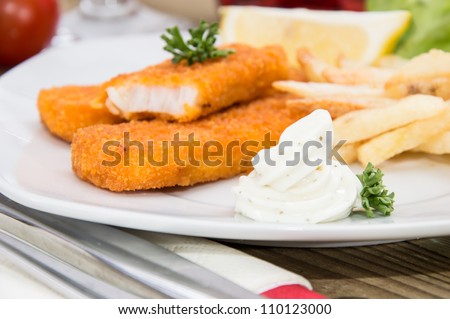 Fish Fingers and Chips on a plate