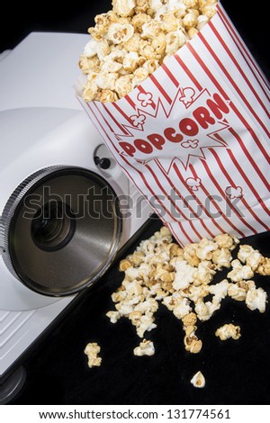 Home Cinema projector with fresh made Popcorn