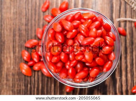 Small portion of fresh Goji Berries (Woldsberry), detailed close-up shot