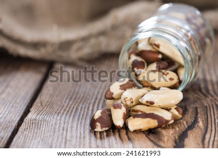 Some Brazil Nuts on vintage wooden background