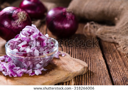 Portion of diced Red Onion (detailed close-up shot)