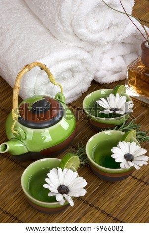 Aromatherapy, relaxing herbal tea and soft cotton towels in a spa