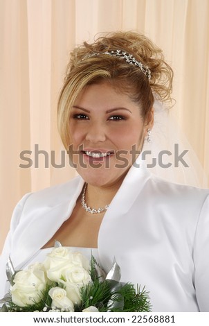 Bride with beautiful hairdo and bouquet