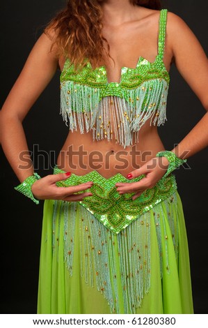 Belly dancer with beautiful green costume