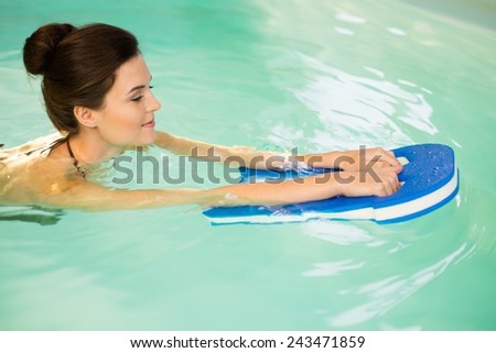 Woman on water aerobics workout