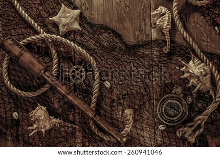 Sea concept on a wooden table background