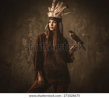 Indian woman hunter with  pet hawk