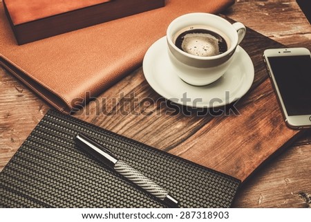Luxurious businessman tools on a wooden table