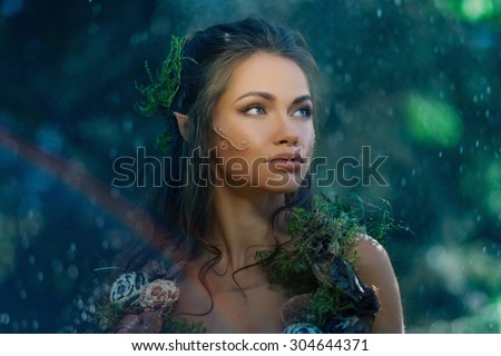 Elf woman in a magical forest
