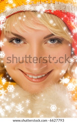 Sweet girl in winter clothing close-up portrait