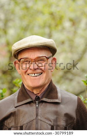 Happy elderly man outdoors