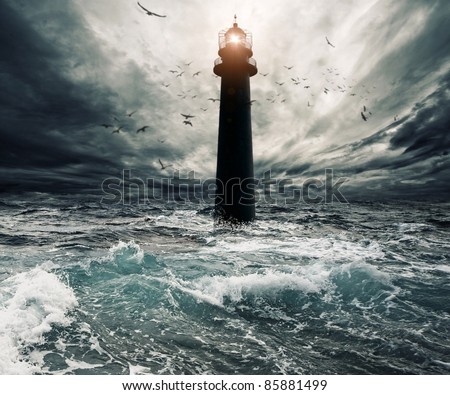 stock photo : Stormy sky over flooded lighthouse
