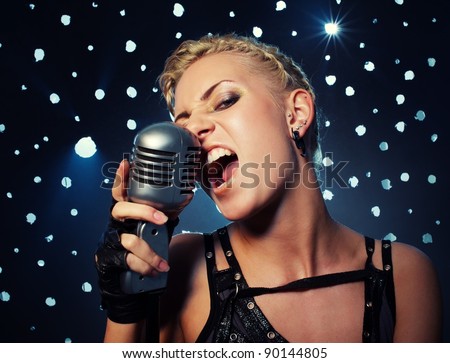 Attractive steampunk girl singing