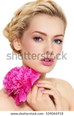 Young beautiful healthy blond girl with pink flower on white background