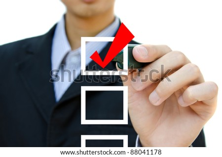 Business hand choosing mark the check boxes of many options.