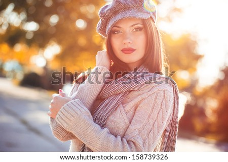 Beautiful vintage style woman in autumn park