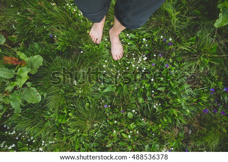 Similar – Image, Stock Photo Top view bare feet of male and female couple standing on wooden bridge