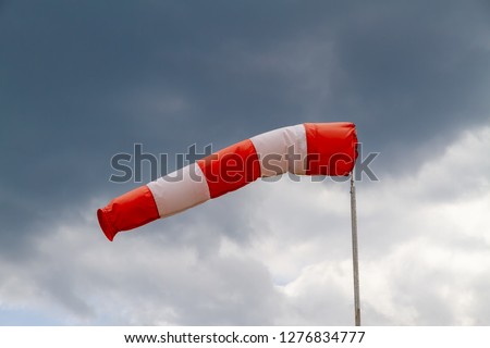 Similar – Image, Stock Photo weather change wind sock