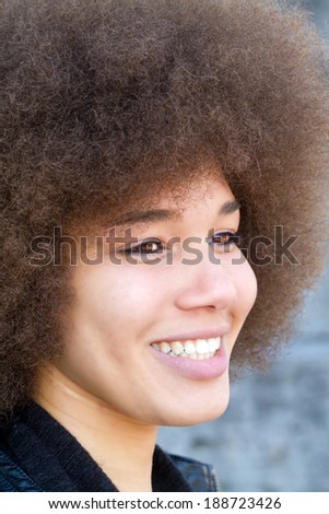 Happy smiling girl with afro hair