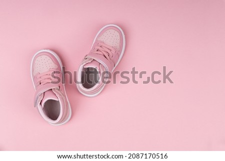 Pink child shoes on pink background. Children's shoes for girls Photo stock © 