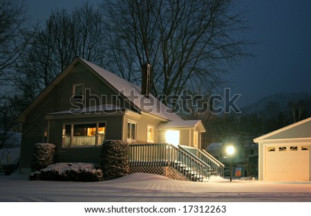 An american home at night during winter.