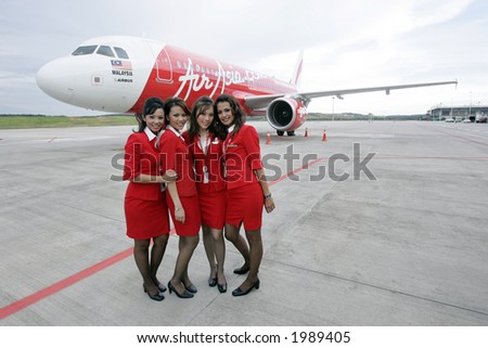 Air crew of Malaysia\'s low cost carrier AirAsia, 2006.