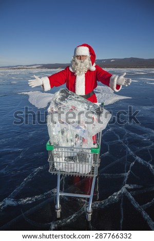 Santa Claus offers pure ice of Lake Baikal, which lies in the cart