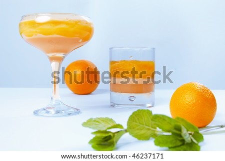 fresh natural orange cocktail and orange fruits
