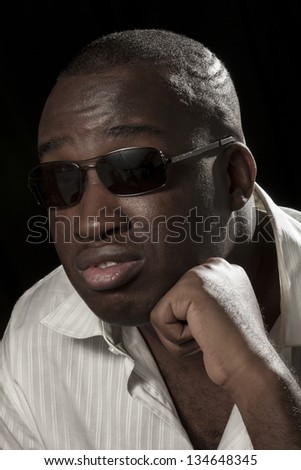 A Blind Nigerian Male Completing His Portfolio Shoot