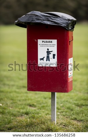 A dog foul waste bin in uk park