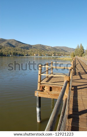 Wooden walkway over a lake; Big Bear Lake, California