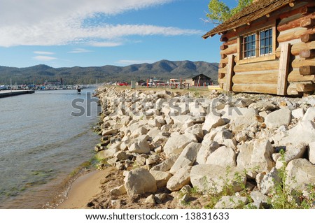 Log house on lake shore; Big Bear Lake, California