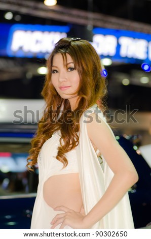 BANGKOK, THAILAND - DECEMBER 6: Unidentified female presenter at Chery booth in THE 28th THAILAND INTERNATIONAL MOTOR EXPO 2011 on December 6, 2011 in Bangkok, Thailand.