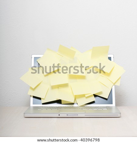 Yellow notes on a laptop screen