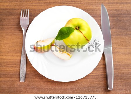 dieting and health food. Yellow, green apple with leaf and white sticker