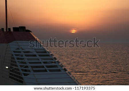 Ship at sunset. The ferry route Italy - Greece, near Bari. Italy. Mediterranean.