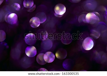 rainbow circle light in dark violet background