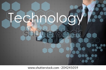 businessman writing Technology with some modern pattern in background