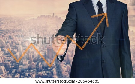 Businessman sketching business concept of growth with nice business city background in retro colors.