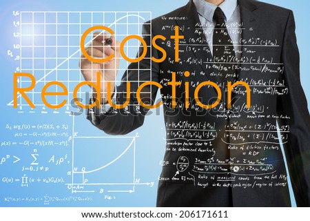 businessman writing Cost Reduction and drawing graphs and diagrams