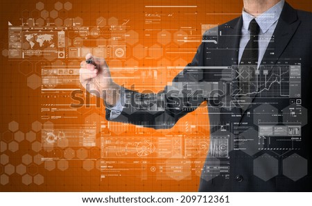 businessman writing some sketches and charts on virtual screen with business or technology background