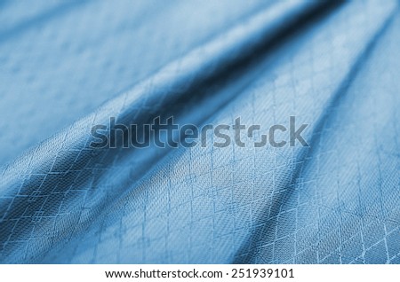 elegant blue background abstract cloth or liquid wave illustration of wavy folds of silk texture satin or velvet material or blue luxurious background wallpaper design of elegant curves blue material