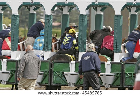 ARCADIA, CA - 7 FEB: Horses are loaded into the gate and ready to race at Santa Anita Park on 7 Feb 2009, in Arcadia, CA.