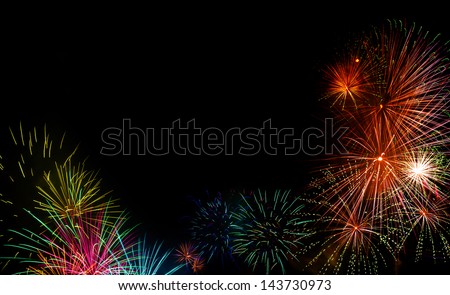 Fireworks used to celebrate special events such as July 4th, Chinese New Year, etc., against black background.