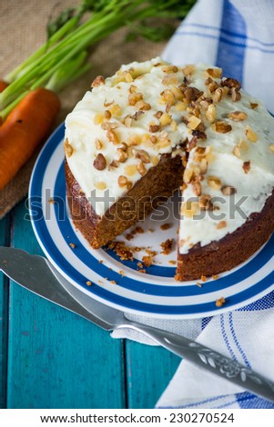Traditional homemade  carrot cake and fresh carrots