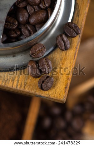 Manual coffee grinder and roasted beans